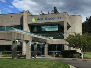 AGC Biologics building exterior with trees.